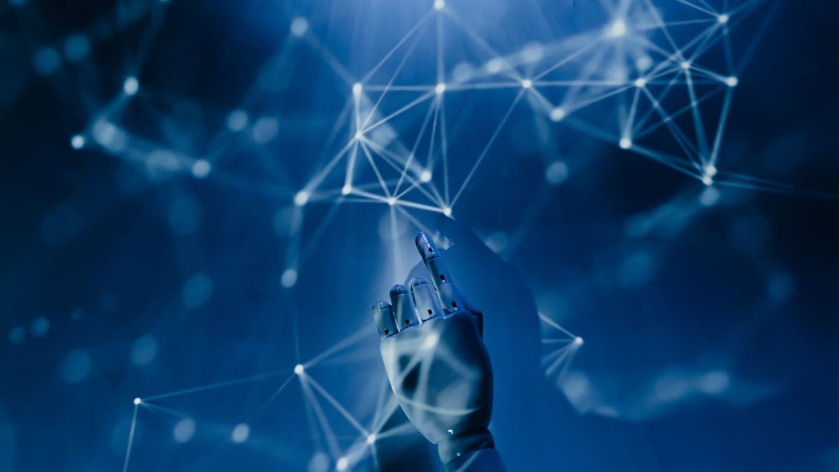 tech graphic with robot hand