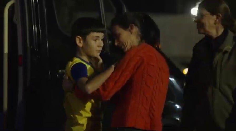 Family reunites after hostage release amid Israel-Hamas war. 