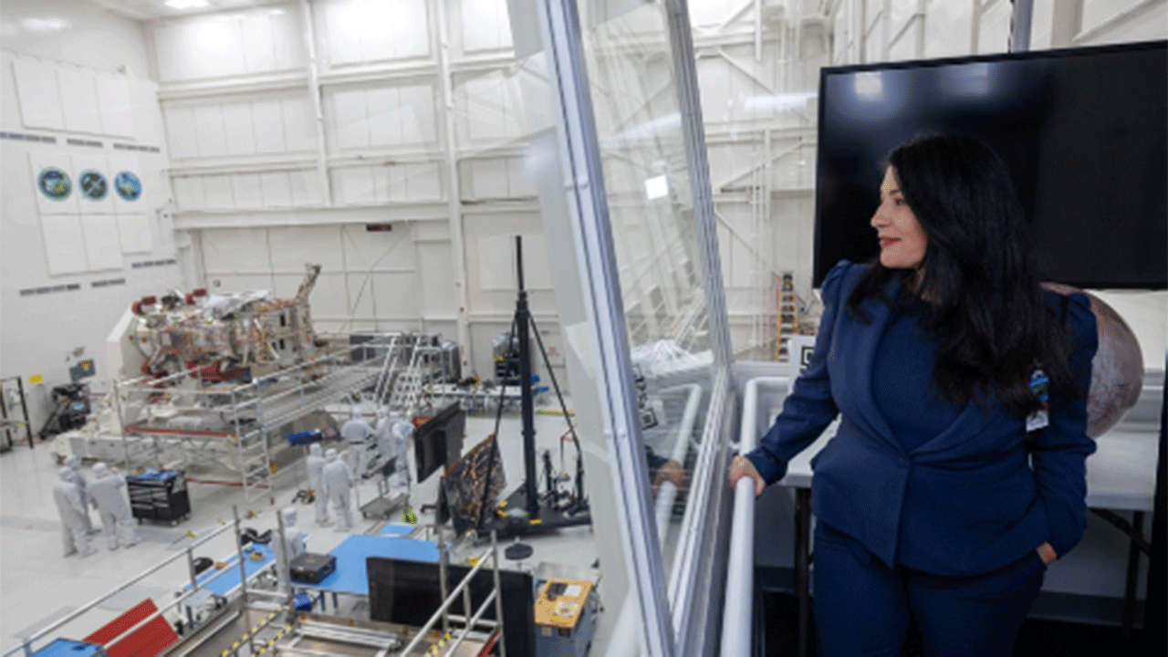 Laureate Ada Limón overlooking Europa Clipper spacecraft