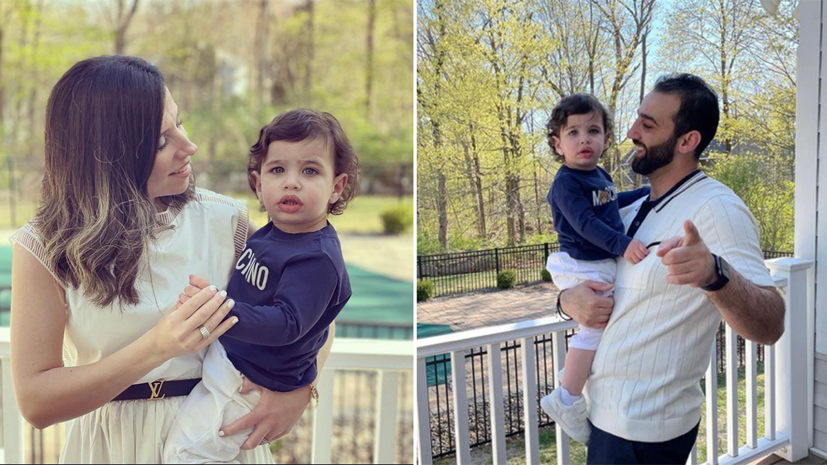 Wafa Abuzayda and Abood Okal holding their son, Yousef
