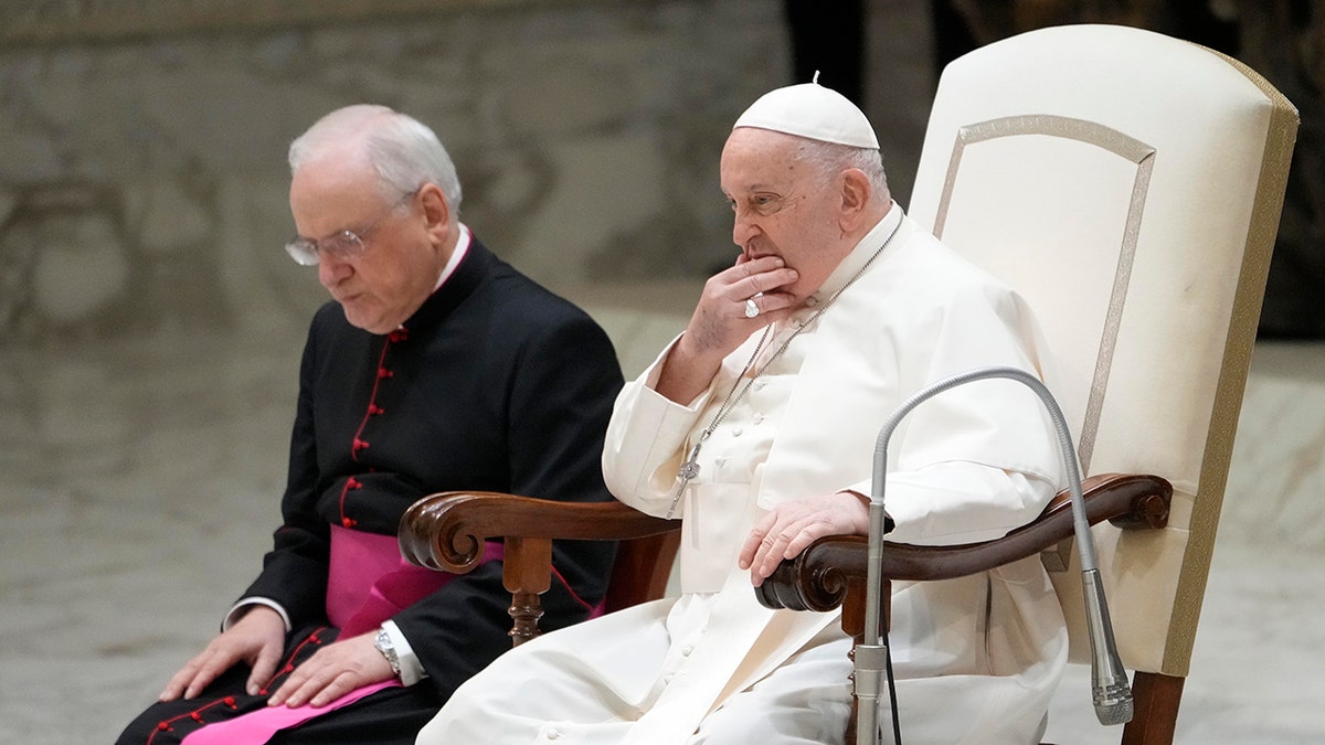 Pope Francis sitting