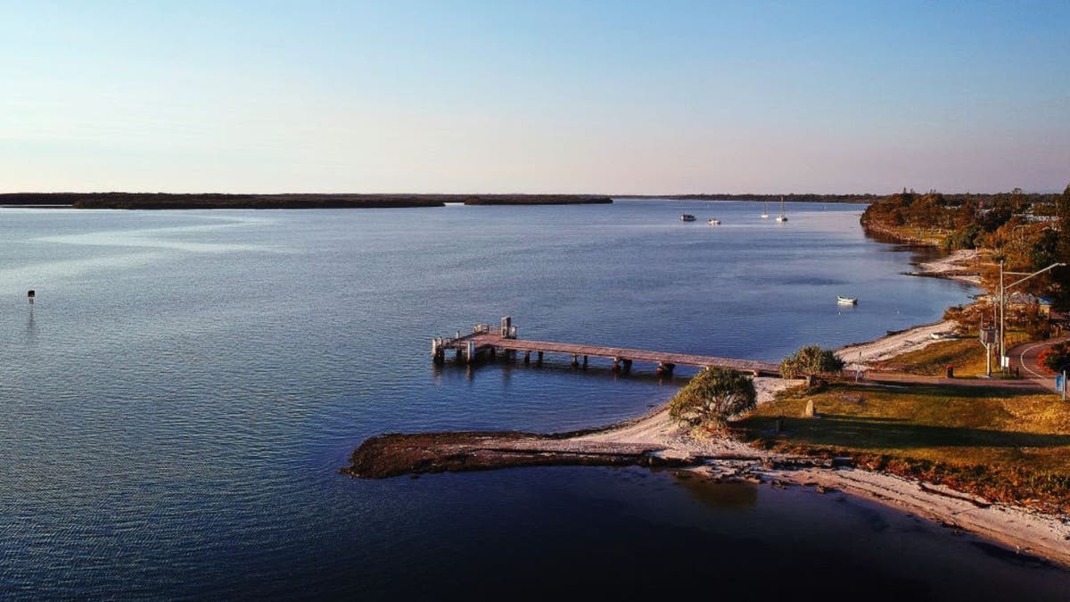An aerial view of the entrance to Pumicestone Passage, a narrow channel of water that separates Bribie Island from the Australian mainland
