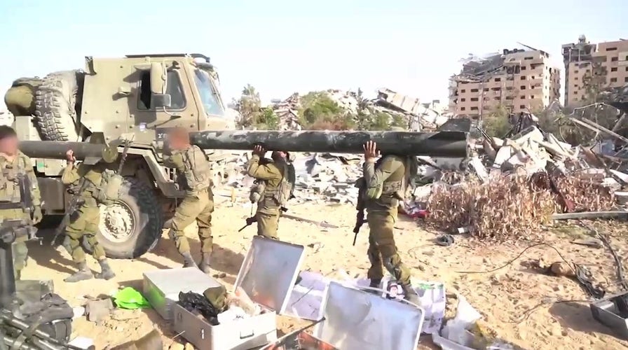 Israel’s military reveals massive Gaza Strip weapons depot its troops discovered 