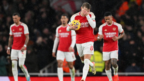 LONDON, ENGLAND - DECEMBER 28: Martin Odegaard of Arsenal reacts after Konstantinos Mavropanos of West Ham United (not pictured) scores their team's second goal during the Premier League match between Arsenal FC and West Ham United at Emirates Stadium on December 28, 2023 in London, England. (Photo by Shaun Botterill/Getty Images)