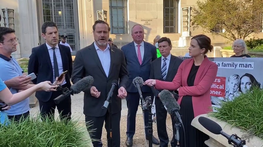 Australian delegation calling on the U.S. to free Julian Assange speaks at a press conference outside the Justice Department