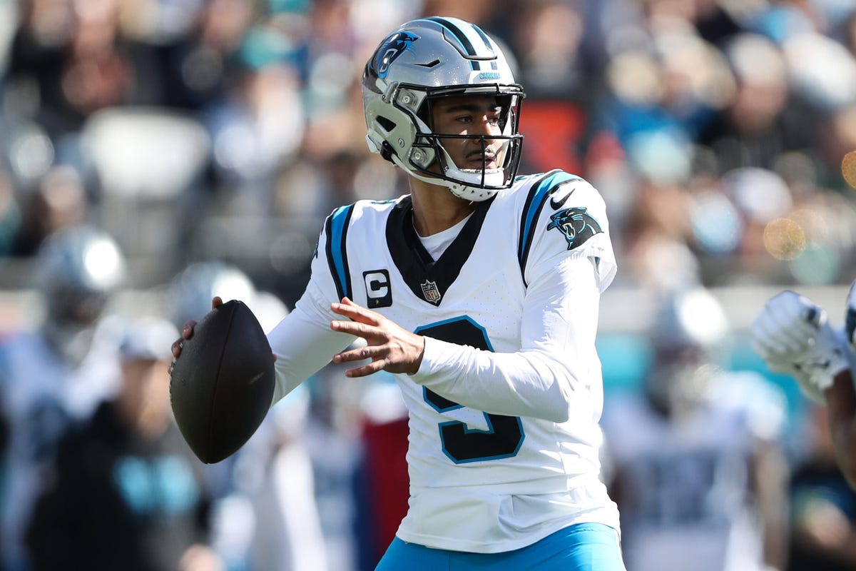 Bryce Young of the Carolina Panthers attempts a pass.