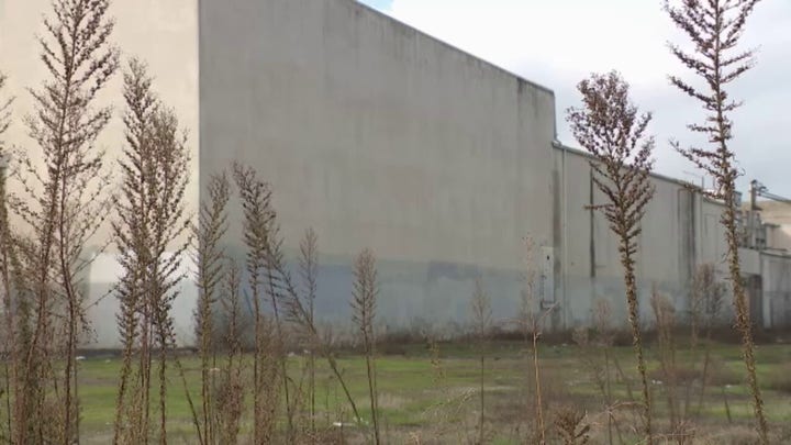 Hazmat crew members remove 800 containers of chemicals from underground Reedy Lab