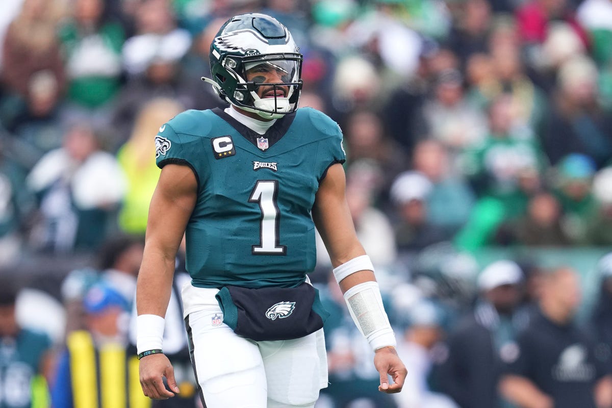 Jalen Hurts of the Philadelphia Eagles looks on.