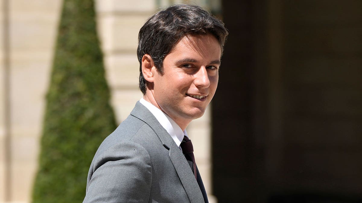 Gabriel Attal walks