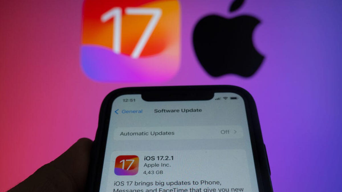 A smartphone in front of a background which has the number 17 and the Apple logo