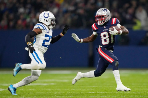 New England Patriots wide receiver Demario Douglas evades Indianapolis Colts cornerback Kenny Moore II. 