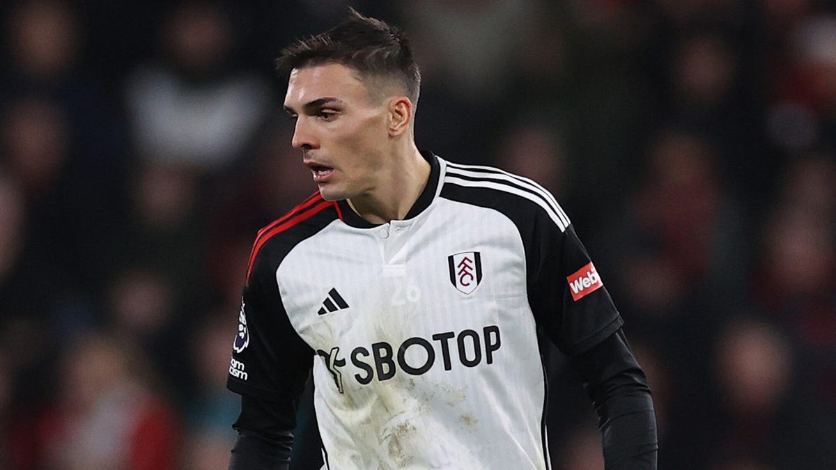 Fulham midfielder Joao Palhinha looking downwards to his right.