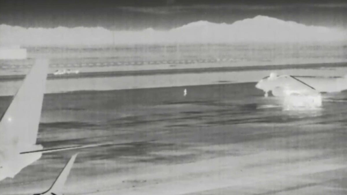 man running on tarmac