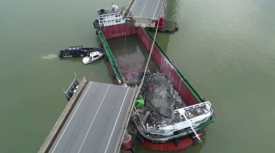 Barge hits China bridge, killing 5 and sending vehicles falling into the water