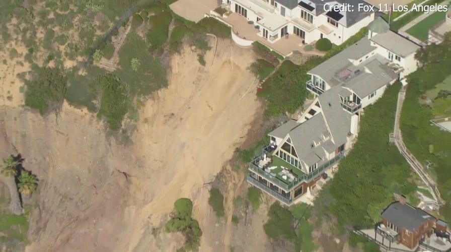 Three multimillion-dollar mansions teeter on the edge of a California cliffside after powerful storms
