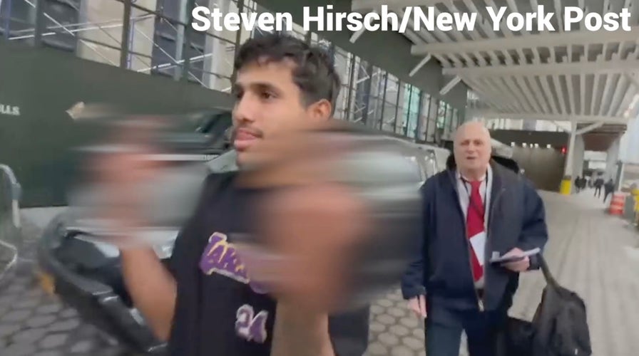 Illegal migrant flips the bird after arrest for attacking NYPD officers