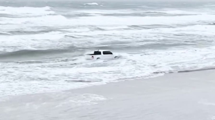 New York man drives truck into ocean at popular Florida beach