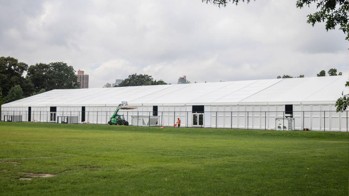 White facade of the Randall's Island migrant shelter