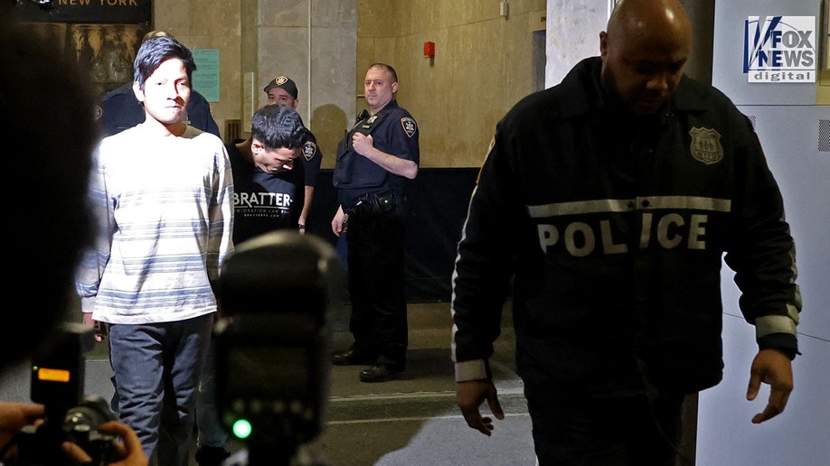 Jandry Barros and Yohenry Brito arrive for their arraignment in Manhattan Criminal Court