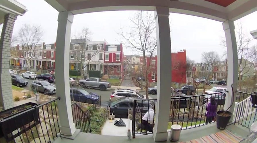 VIDEO: Driver hops curb in allegedly stolen car, nearly hitting woman and dog on sidewalk