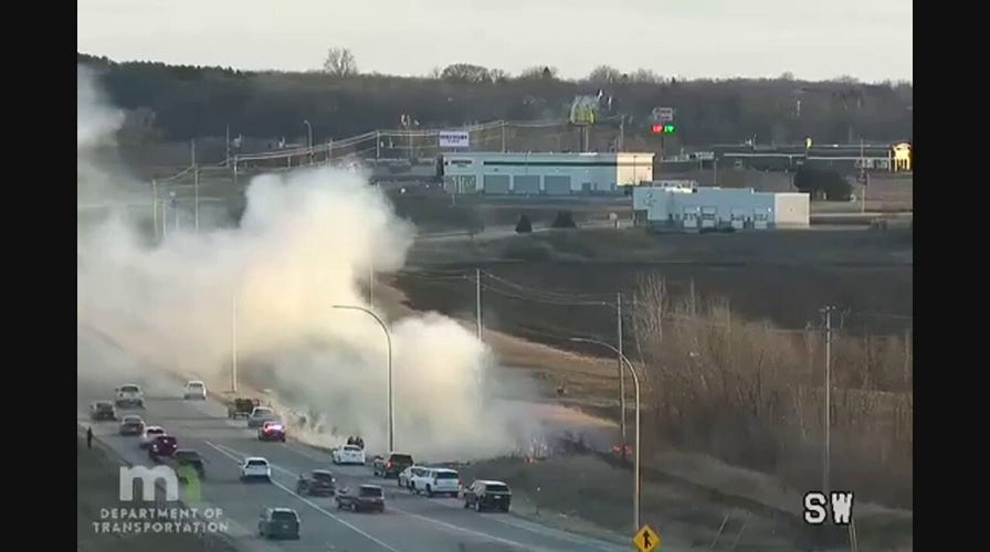 Balloon crashes into power line, causing basket to break off, starting fire