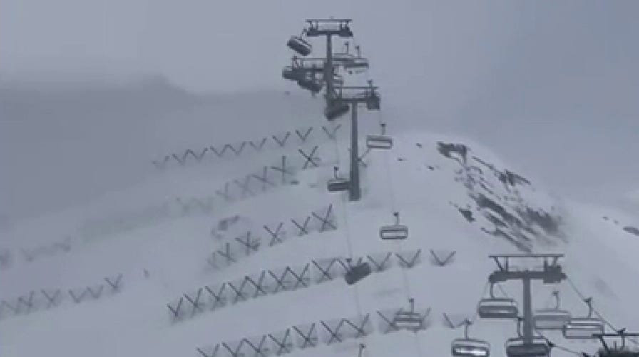 Strong winds swing chair lifts at ski resort in Italy