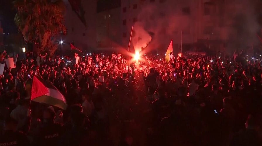 Jordanian security forces hold back protesters calling for a siege of the Israeli embassy in Amman last week