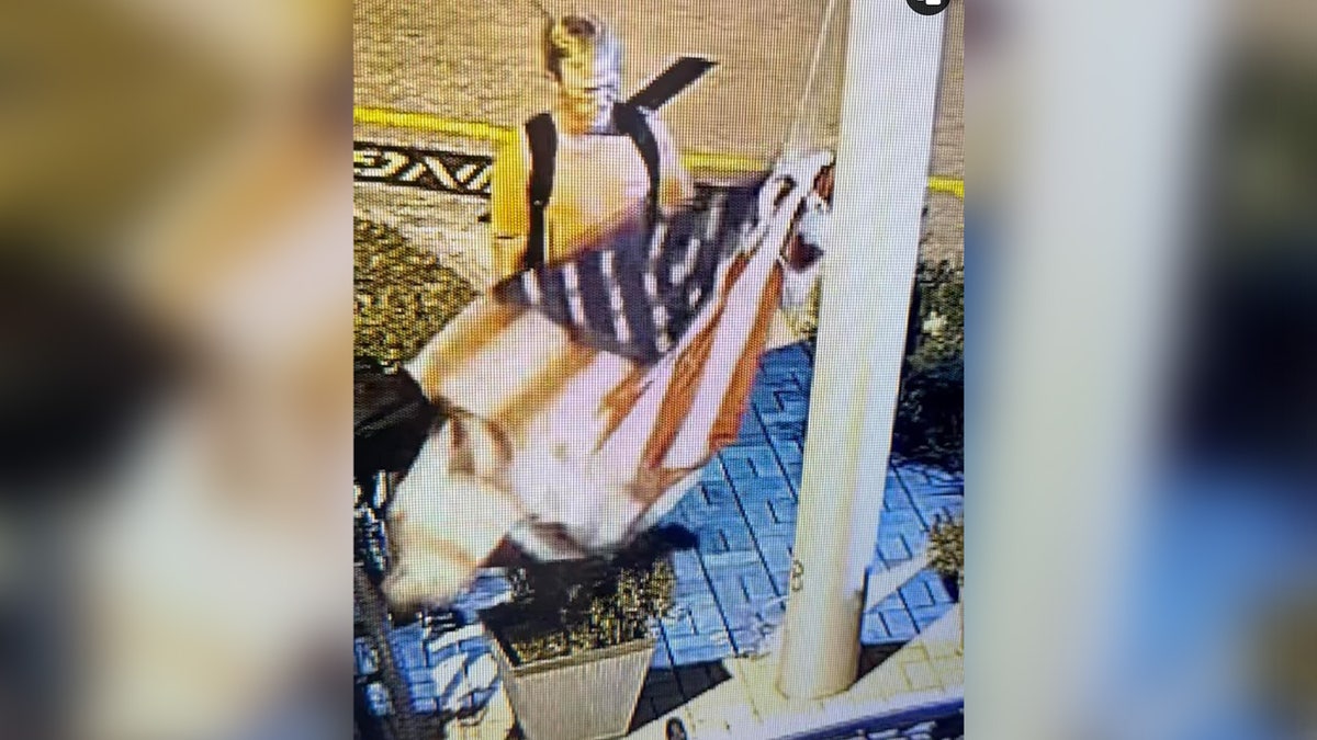 Flag being torn down