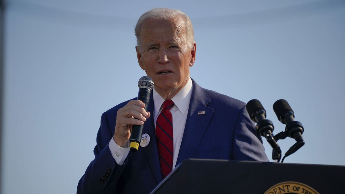 BIDEN AT MICROPHONE
