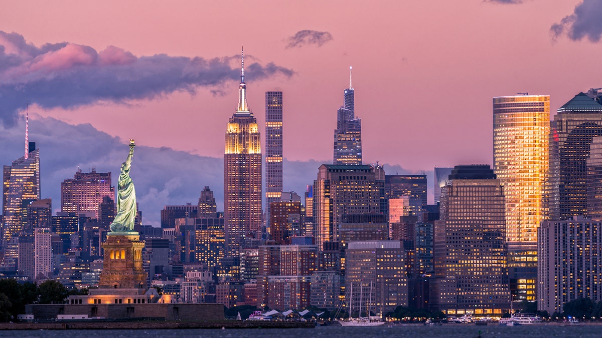 New York skyline with Statue of Liberty at left