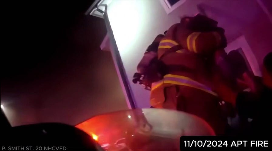 Texas firefighter pulls 2-year-old from burning apartment building in dramatic rescue