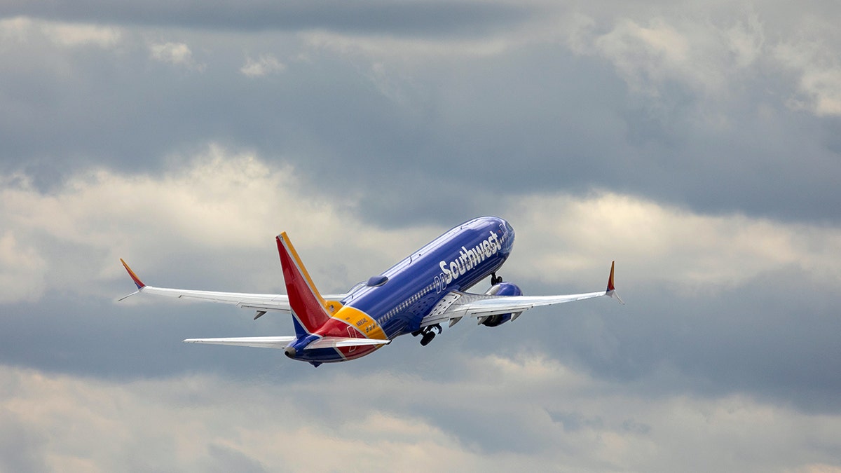 Rear view of Southwest plane mid-flight