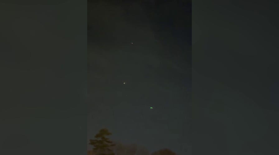 Woman films several possible drones flying overhead in Connecticut