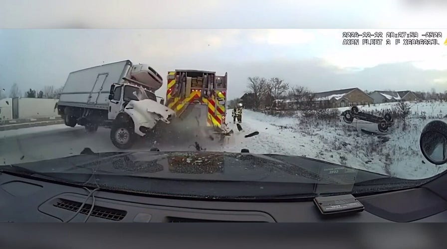 Out-of-control truck jackknifes first responder vehicles on icy highway in Michigan