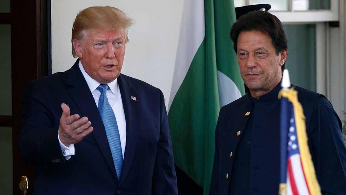 President Donald Trump greets then-Pakistan's Prime Minister Imran Khan at the White House, during his first term as president.