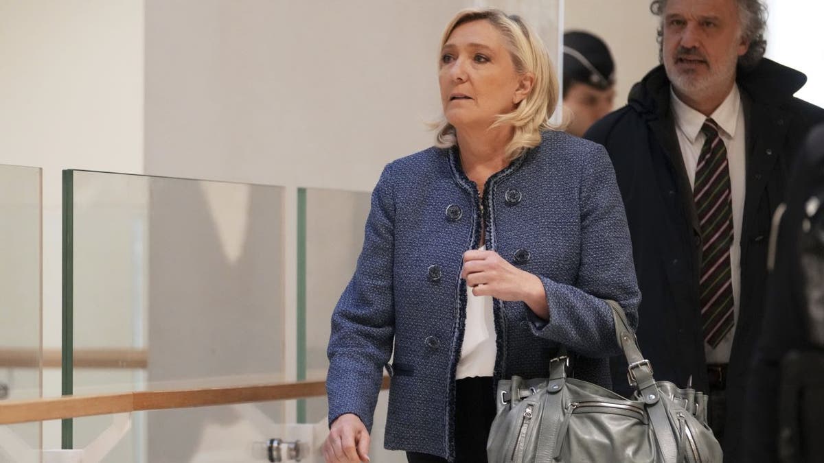 French right-wing leader Marine Le Pen arrives at a Paris court expected to deliver a verdict in an embezzlement case that could shake up French politics and derail far-right leader Marine Le Pen's career Monday, March 31, 2025 in Paris. (AP Photo/Thibault Camus)