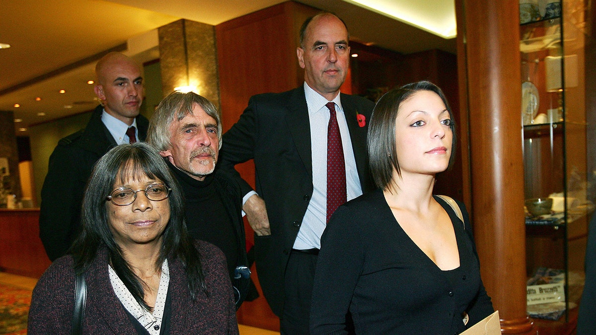 Meredith Kercher's family walking inside the courtroom.