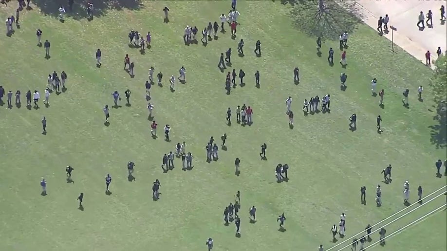Students in open field near Wilmer-Hutchins High School