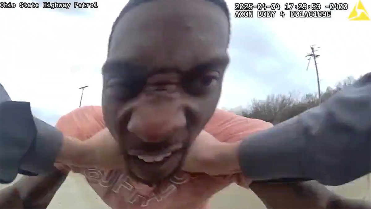 Deshawn Leeth fights with an Ohio State Patrol officer.
