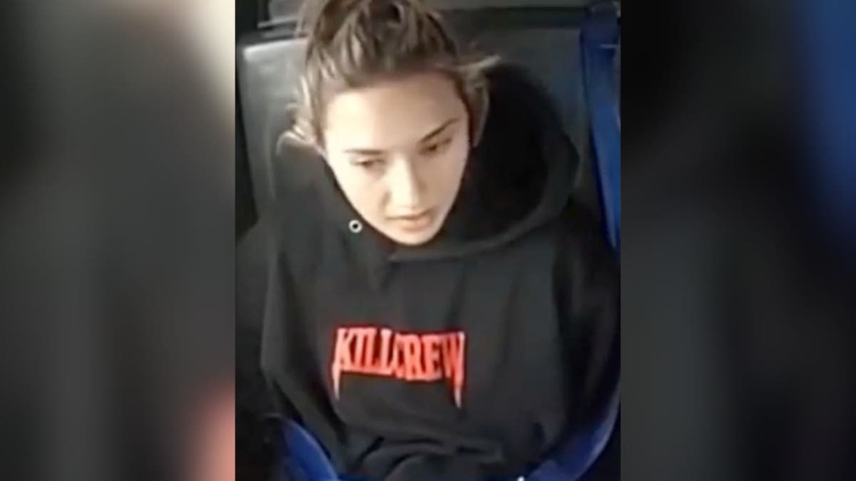 Christina formella in a police car