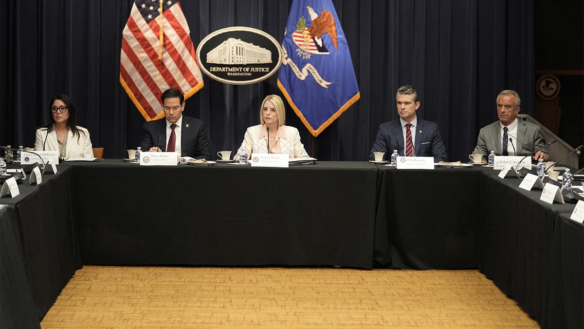 Task Force for Eradicating Anti-Christian Bias meeting shows various Cabinet officials around a table