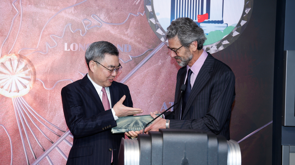 Now-former Chinese Consul General Huang Ping, left, and Chairman, President and CEO of Empire State Realty Trust, Inc. Anthony E. Malkin light the Empire State Building in celebration of the Lunar New Year at the Empire State Building on Jan. 20, 2023 in New York City.