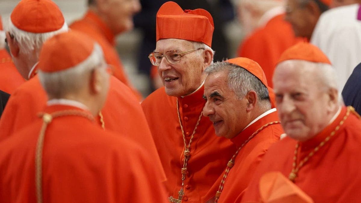 Cardinals speaking in small groups in Rome