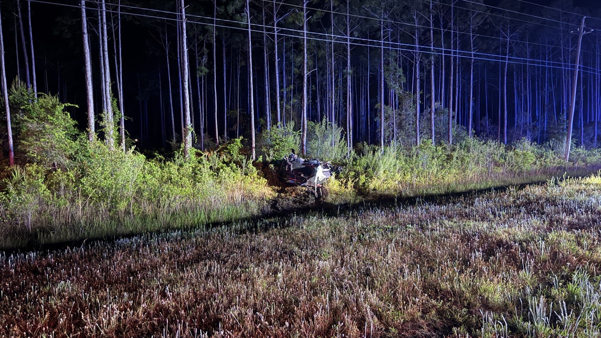Florida Highway Patrol crash scene photo of an SUV carrying four high school students, three of whom died in the accident.