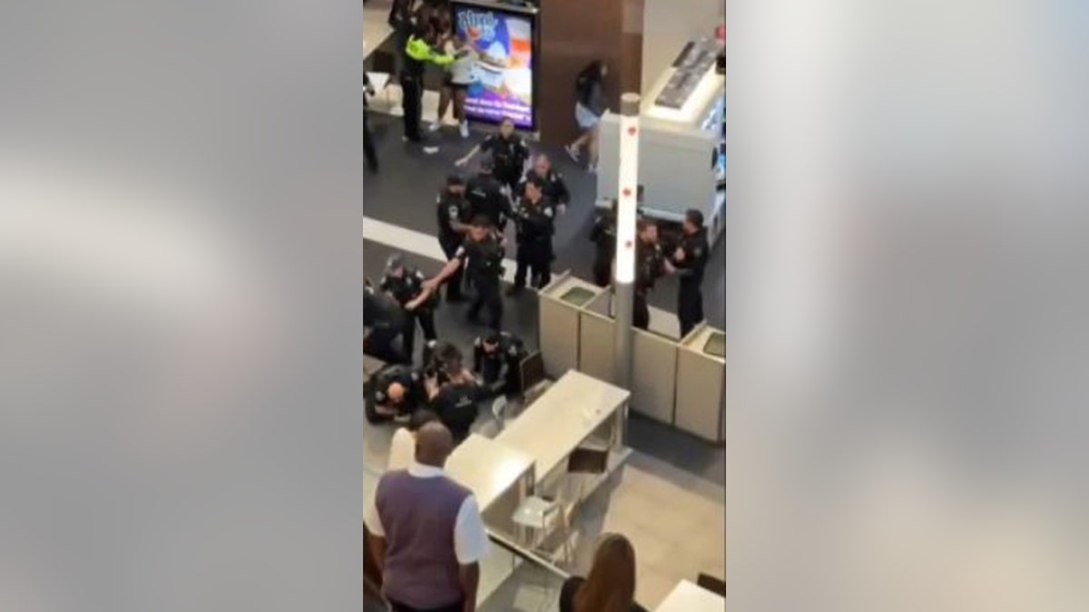 Police responding to fights in mall food court