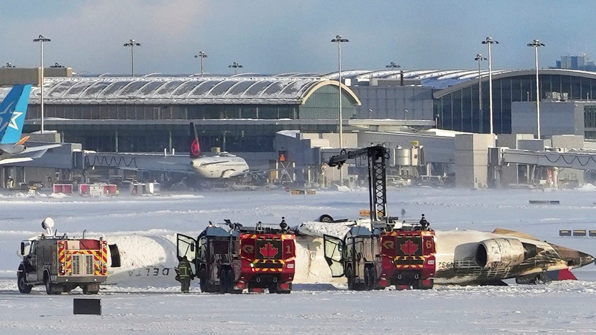 Flipped Delta plane in the snow at Toronto airport