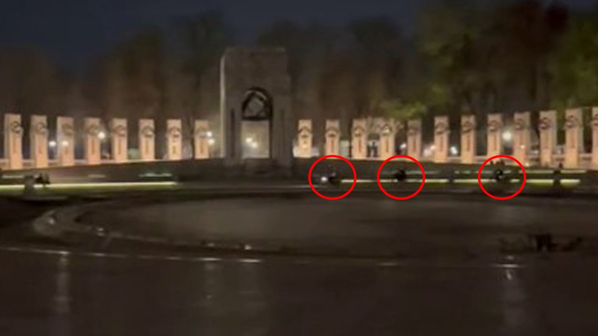 ATVs being driven around World War 2 Memorial