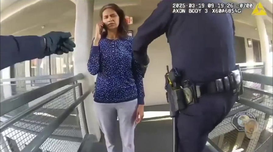 Body camera footage shows a mother with 'blood on her hands' as police arrest her for allegedly killing her young son