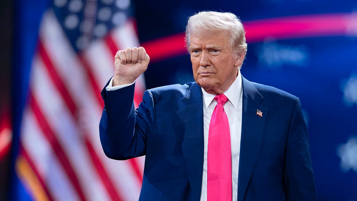 President Donald Trump gestures to the crowd at the Conservative Political Action Conference, CPAC, at the Gaylord National Resort &amp;amp; Convention Center, Saturday, Feb. 22, 2025, in Oxon Hill, Md. 