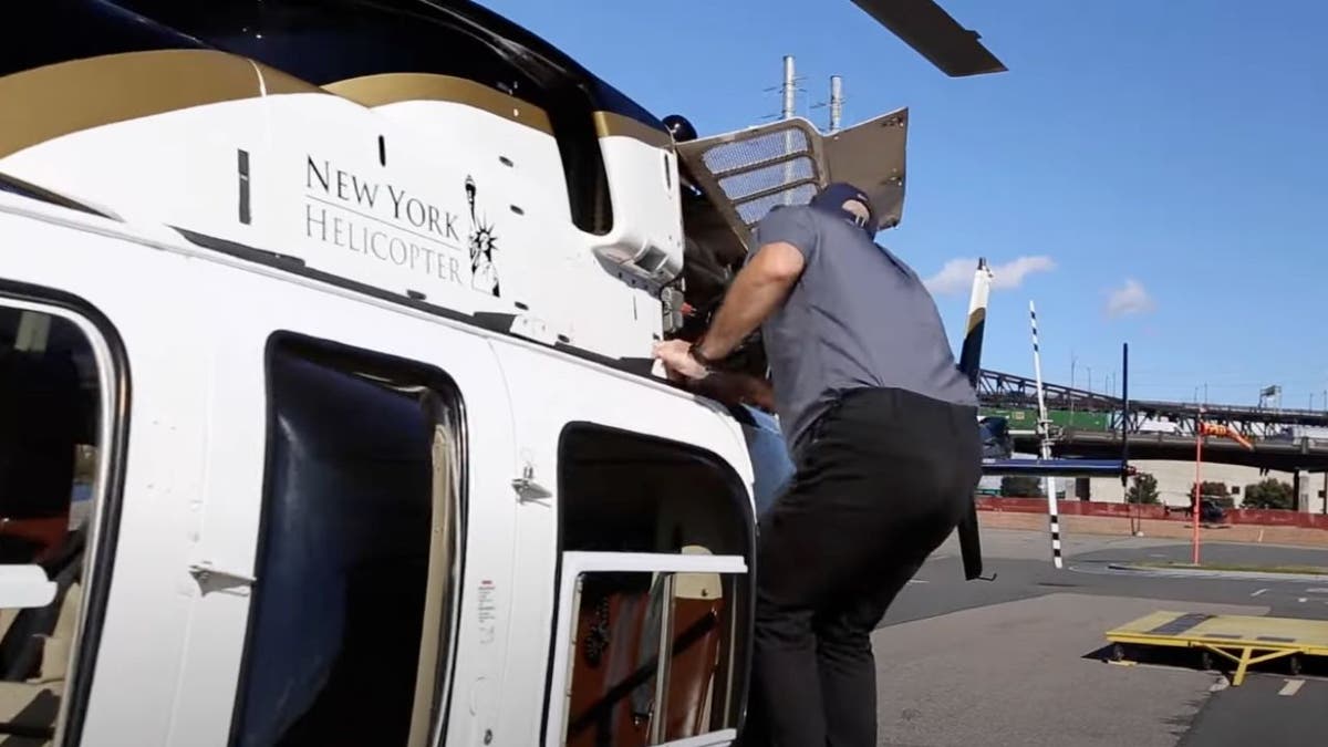 New York Helicopter worker inspects the aircraft